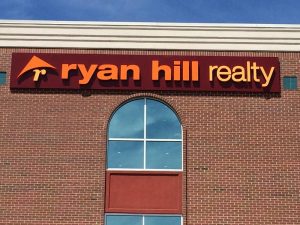 Real Estate Signs ryan hill realty storefront sign 300x225